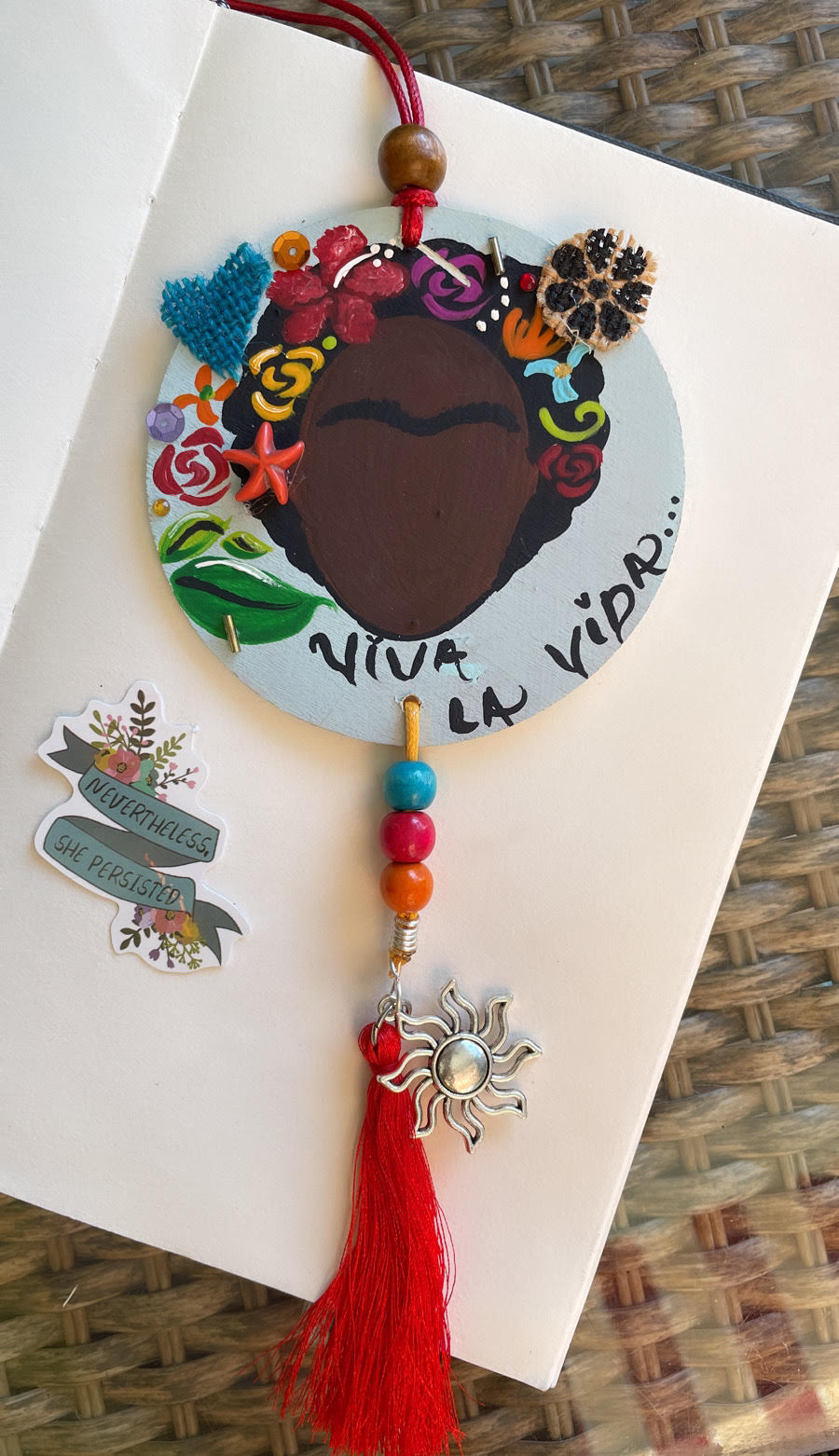 Black queen Frida car charm.